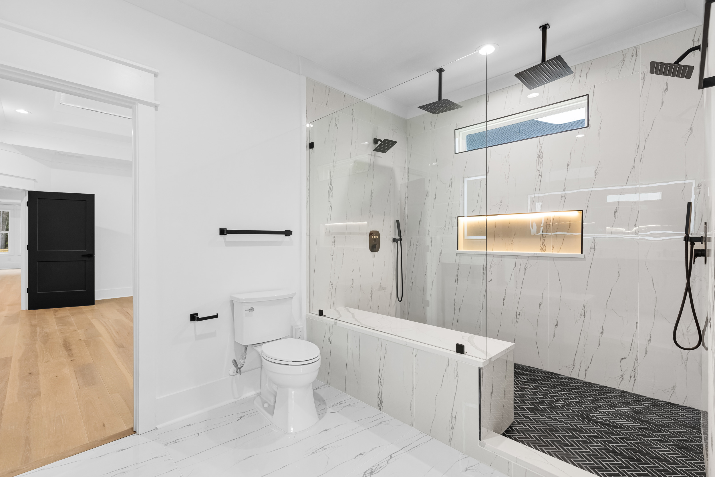 Primary bathroom with tub and walk-in shower